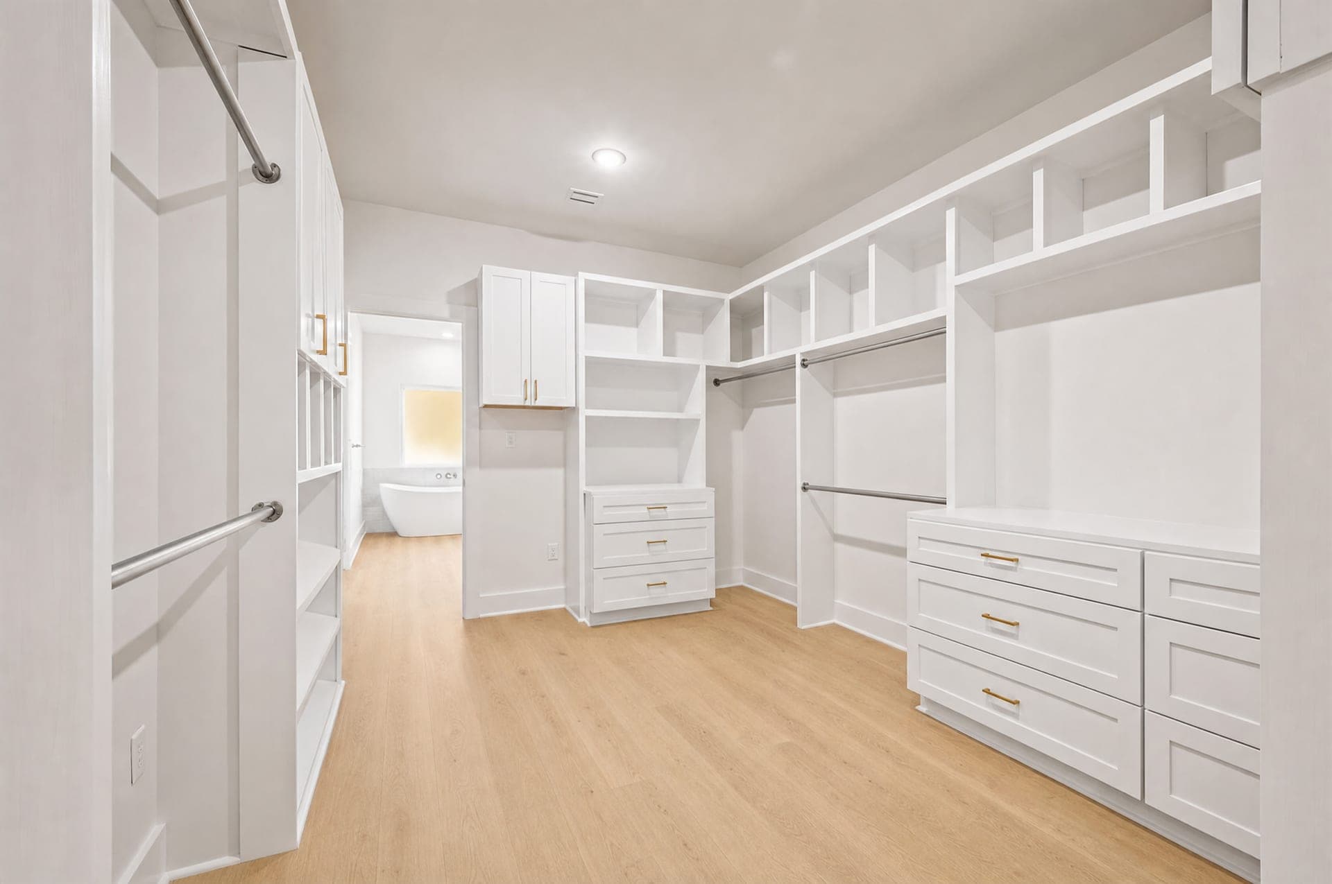 Rendering of the Cambridge primary walk-in closet with built-in shelving and drawers, artist's concept