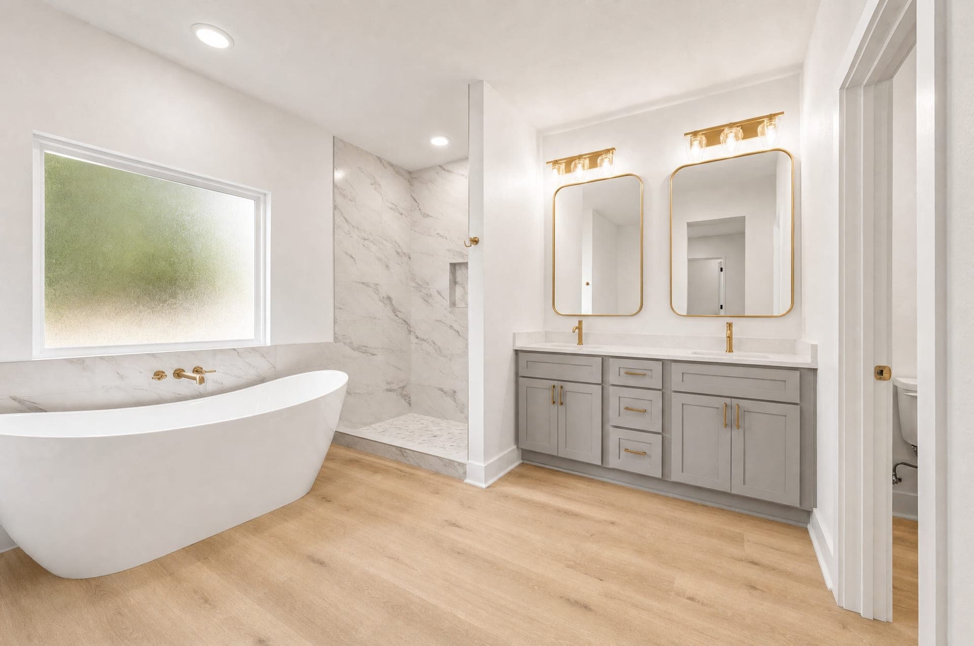 Rendering of the Cambridge primary bath with freestanding tub and walk-in shower, artist's concept